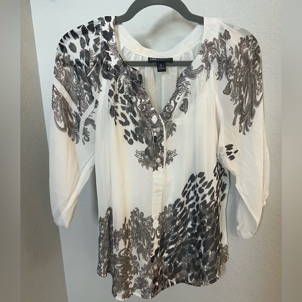 Black and white patterned blouse